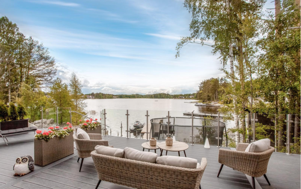 Semi-Framed Stainless Steel Ultimate Balustrade System Overlooking a Lake in Finland