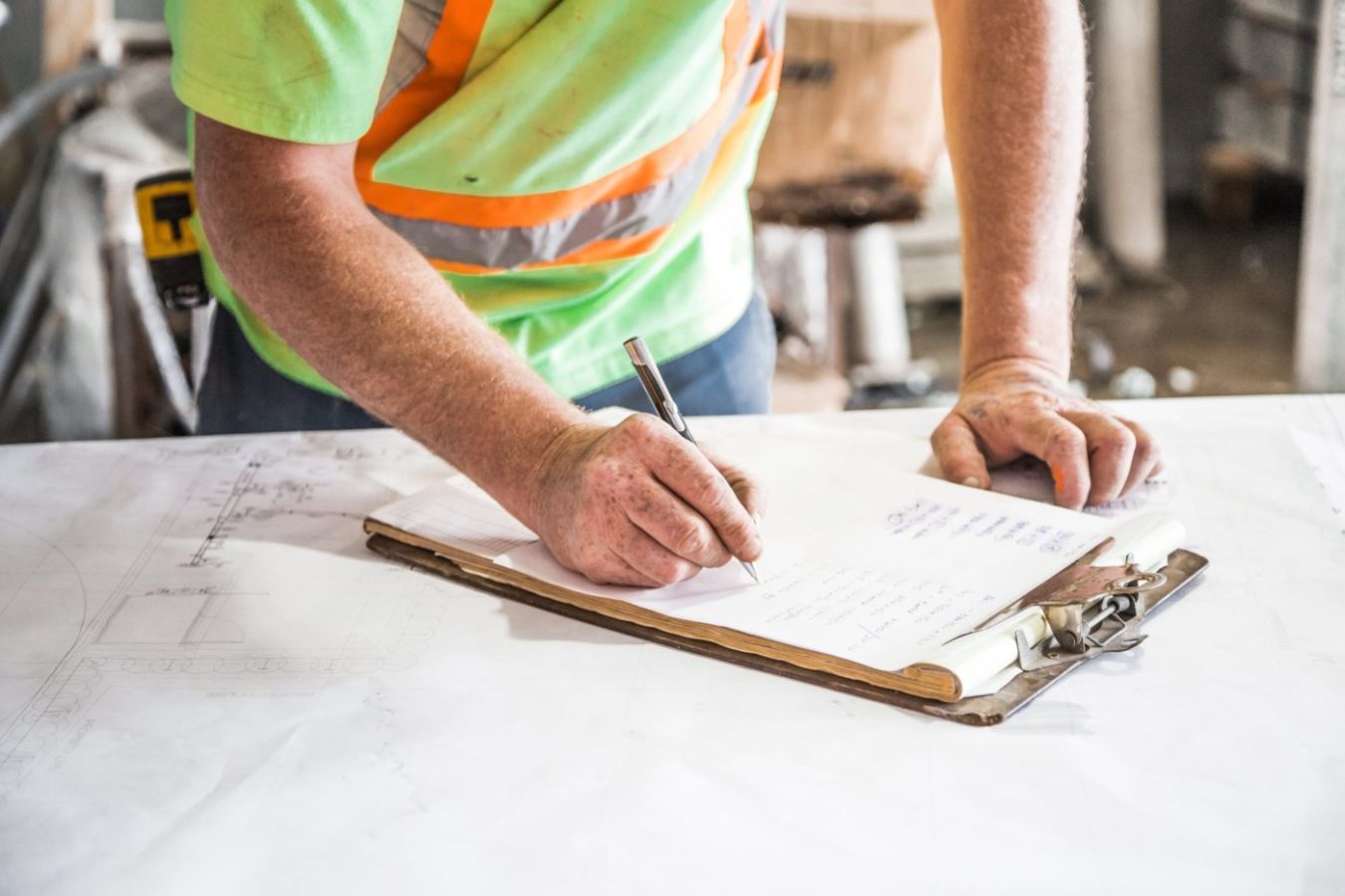 site-survey-and-installation Installer completing a site survey document