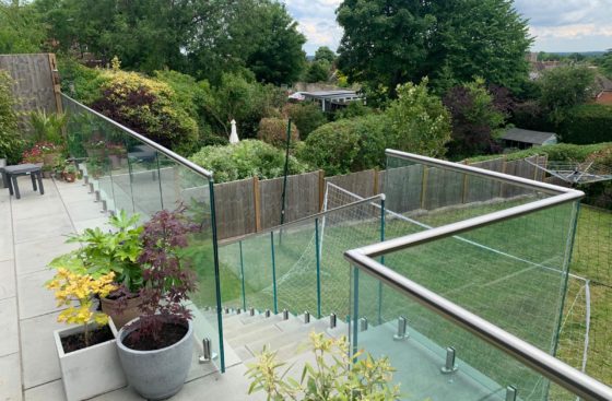 Frameless 2205 Duplex Stainless Steel Spigot Balustrade on Concrete Patio