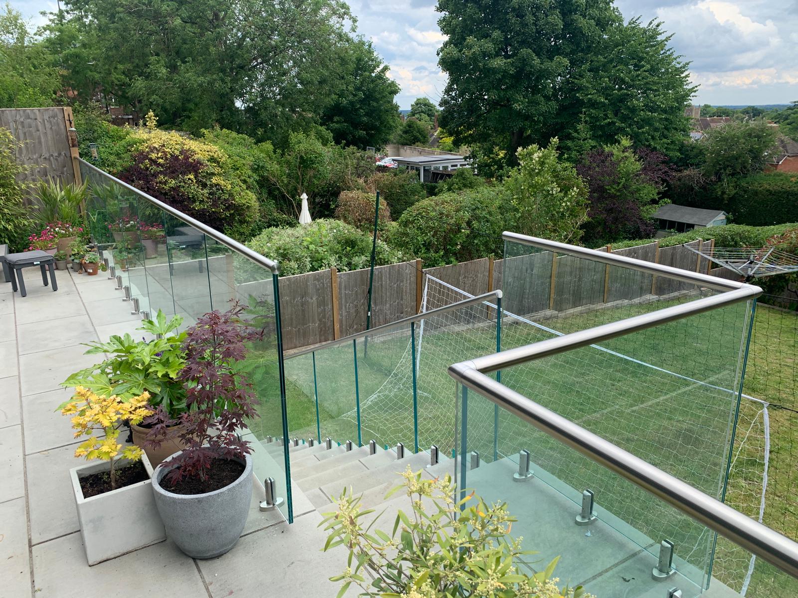 Frameless 2205 Duplex Stainless Steel Spigot Balustrade on Concrete Patio